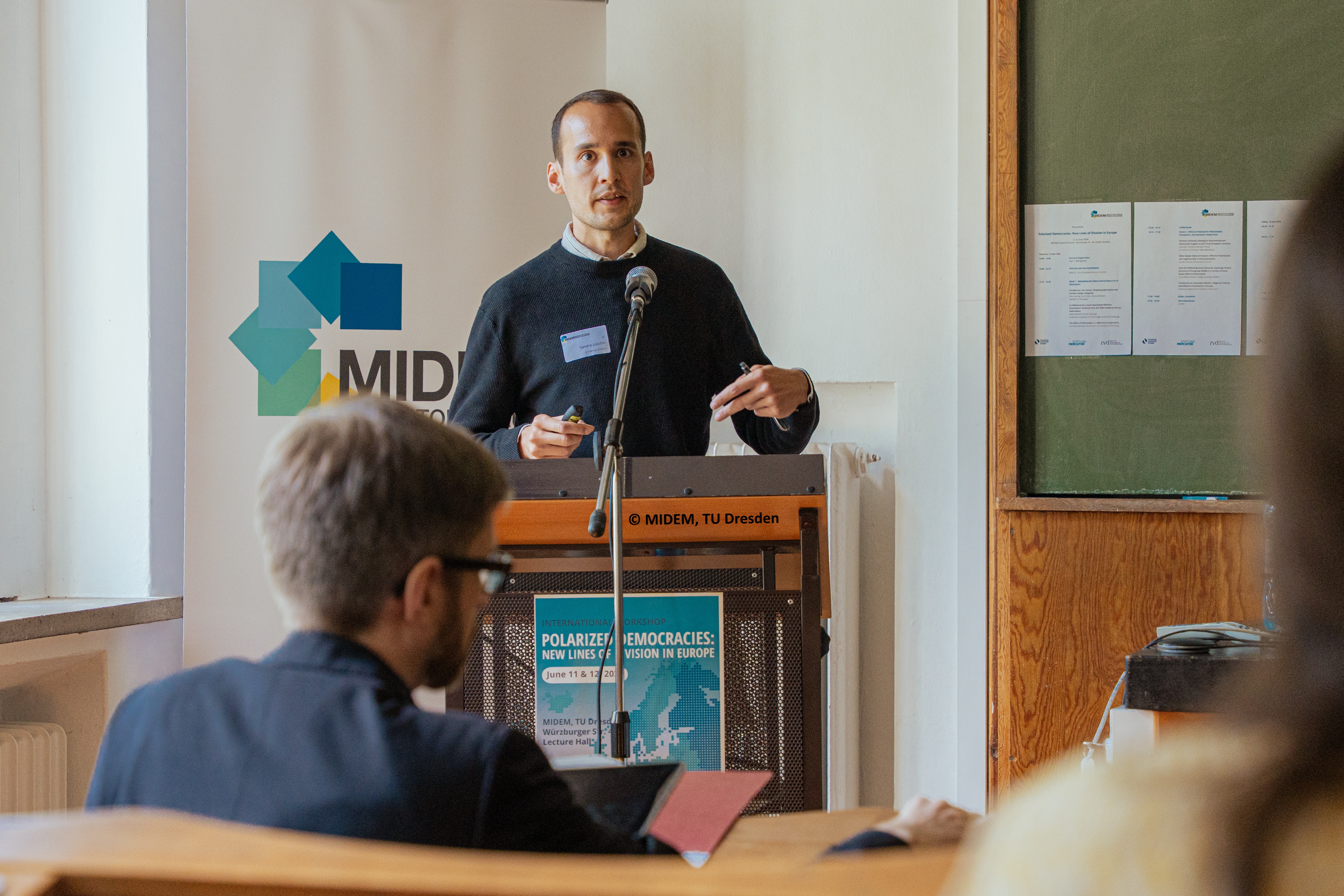 Giving a presentation at a podium